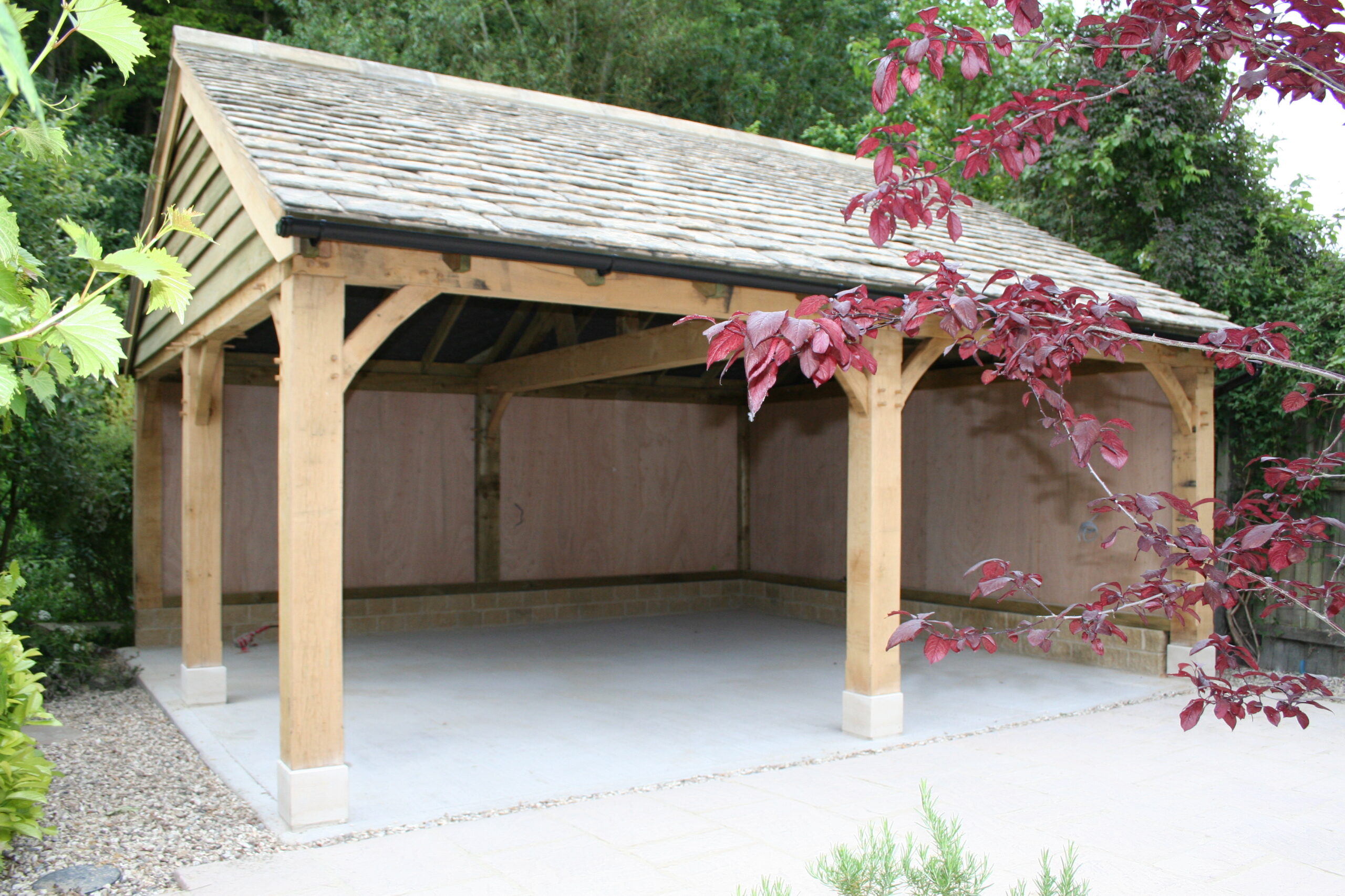 image showing an Oak framed single carport and garage