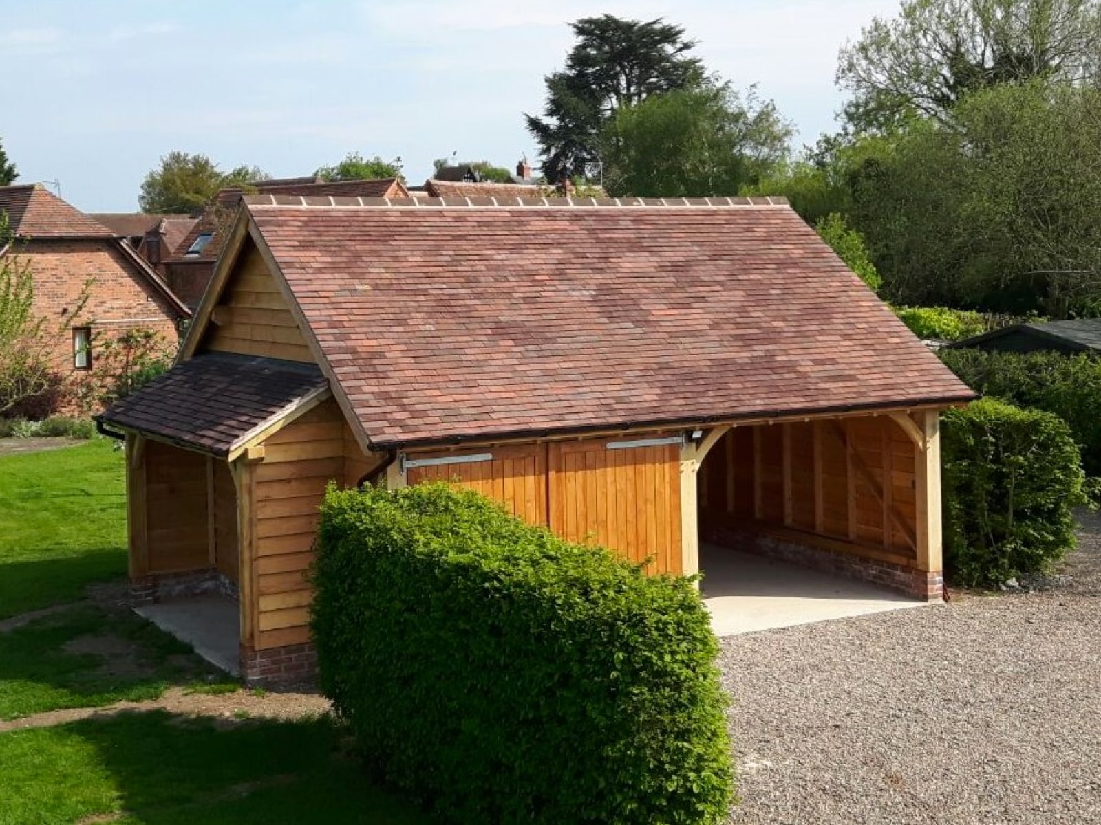 Oak frame single carport and garage